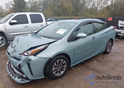 2021 Toyota Prius Xle z USA, uszkodzony, nr VIN JTDKAMFU2M3147447
